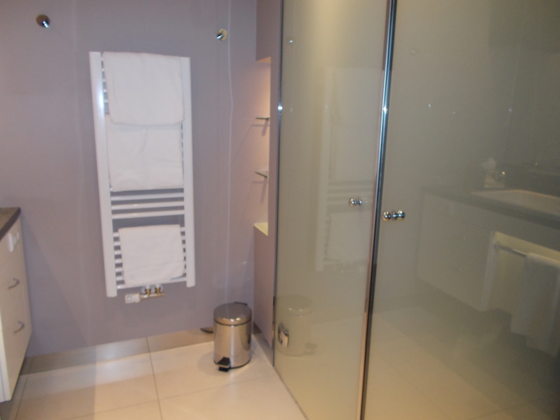 Roomy Bathroom with Towel Warmer