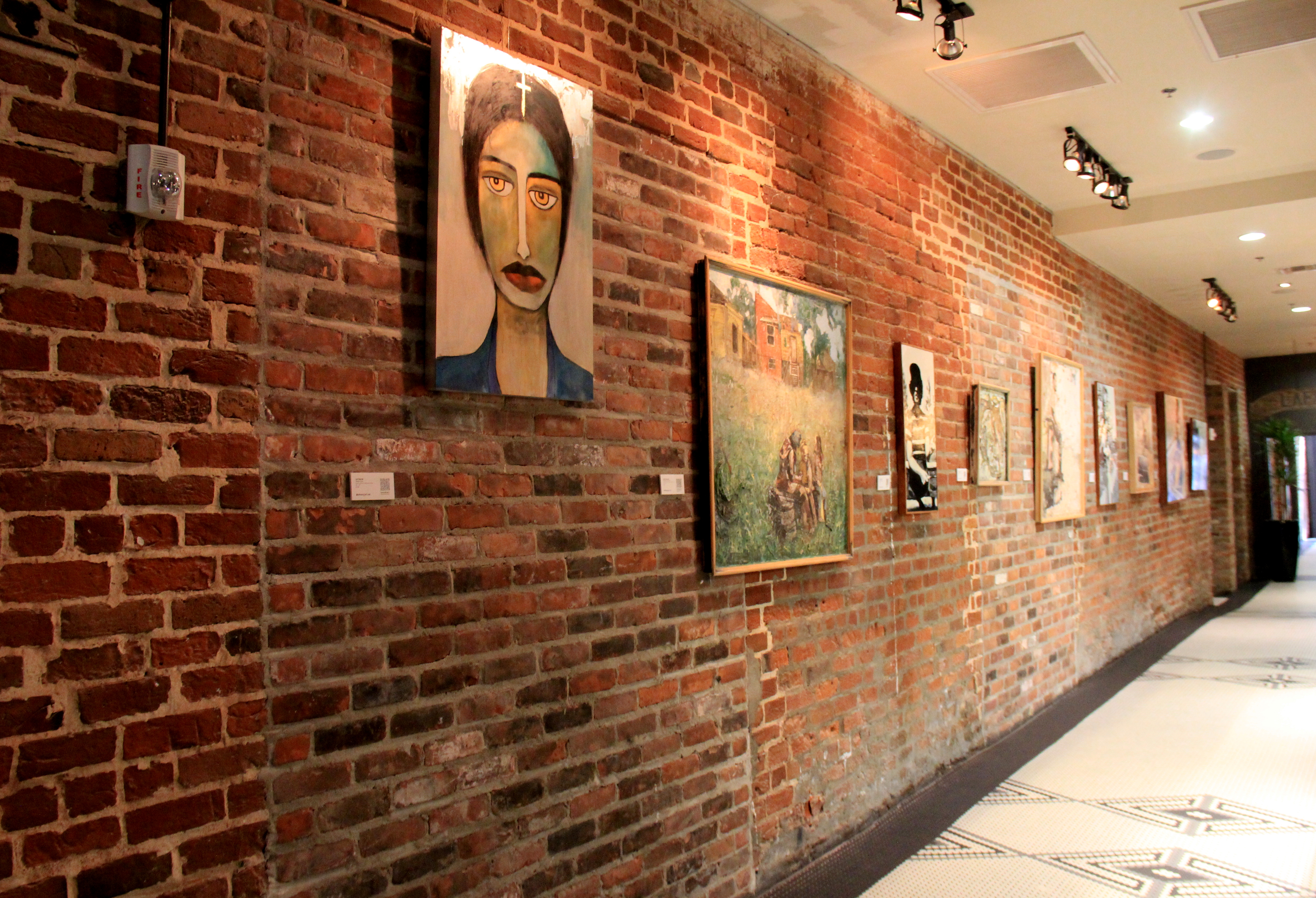 Paintings on brick wall -Old 77 Hotel and Chandlery