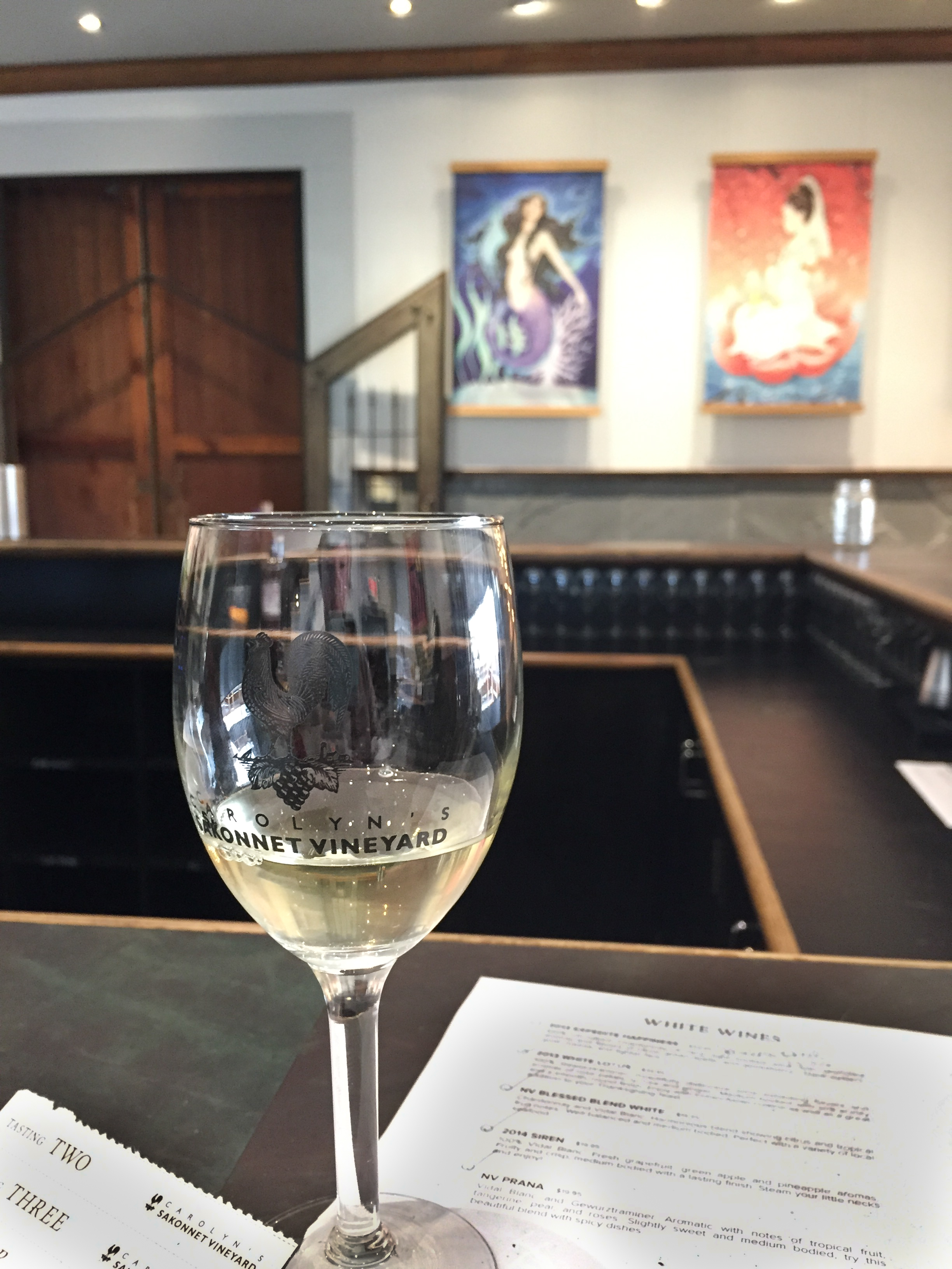 White wine in tasting room The Coastal Wine Trail