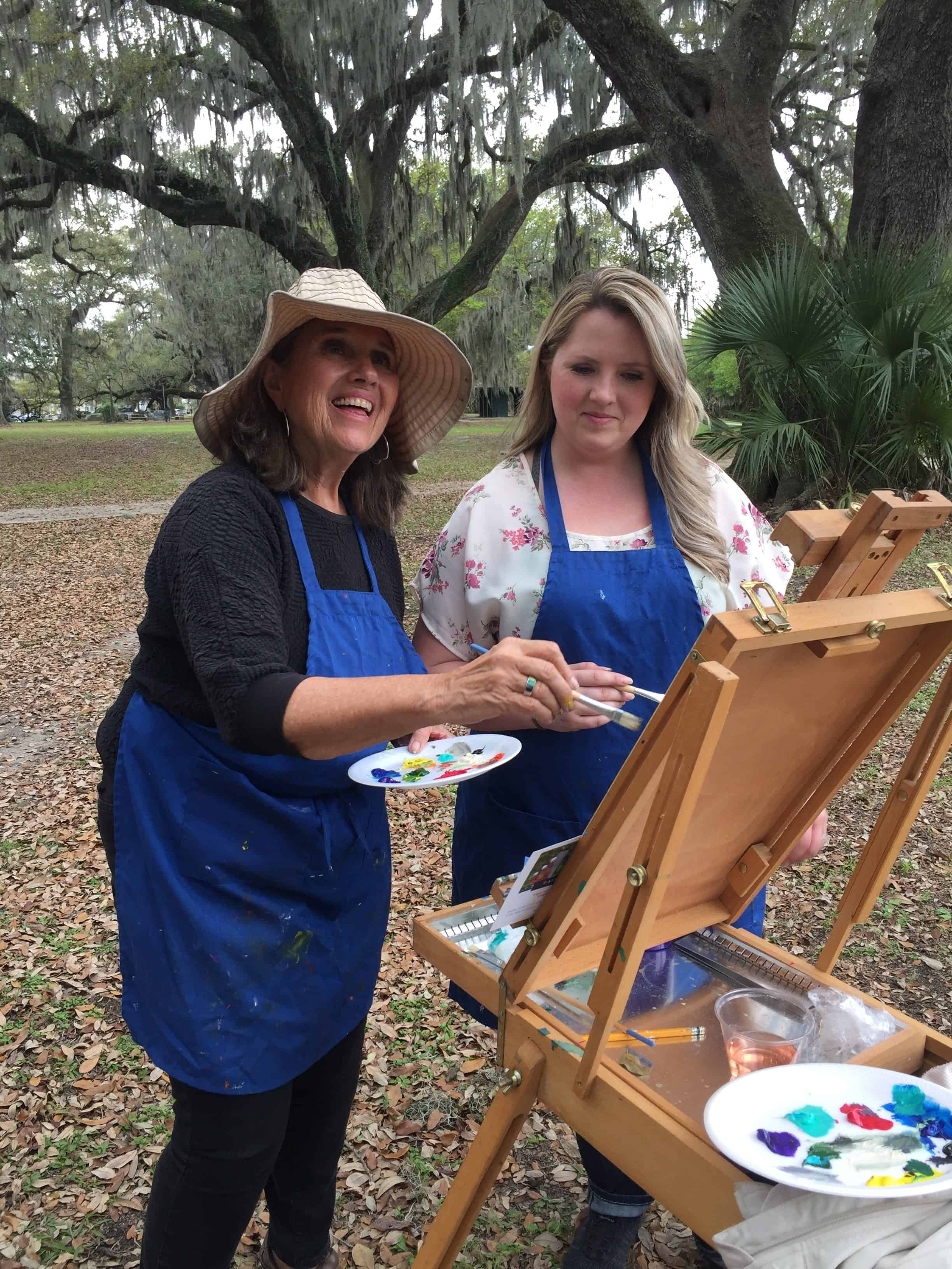 Paint Dat's Gloria Willis instructing student