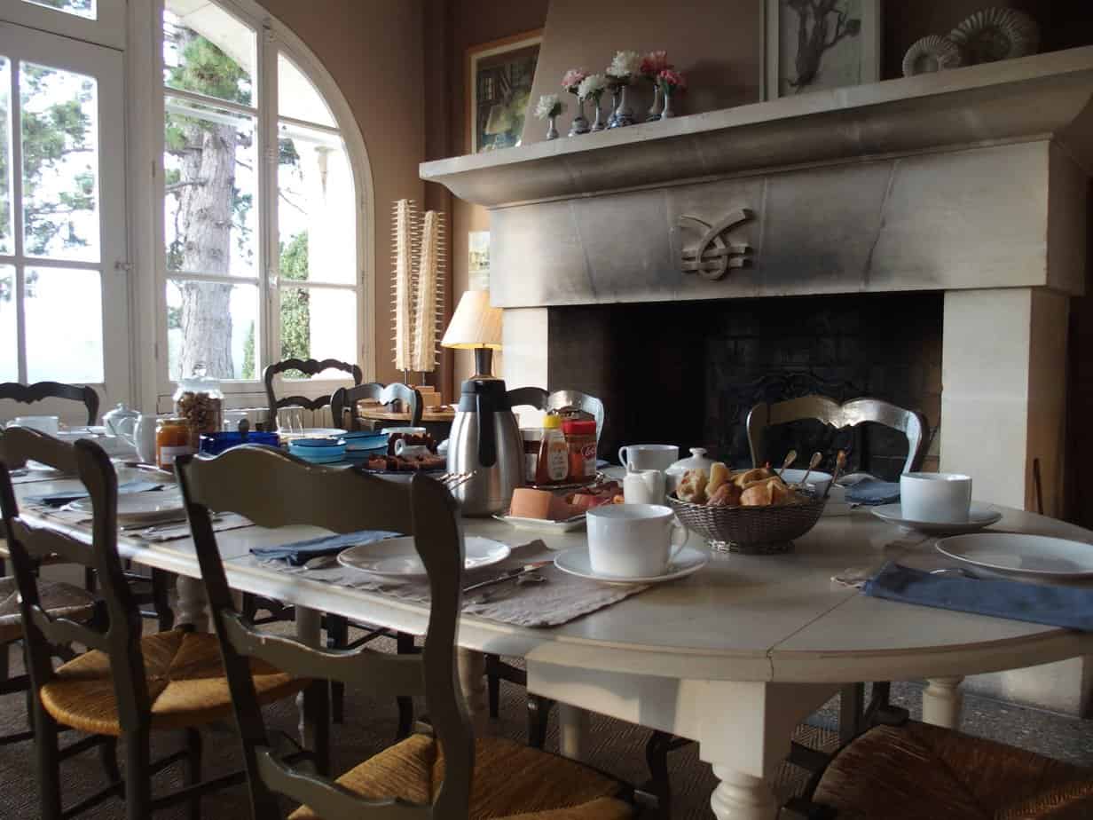 Breakfast by the fireplace at La Couronne