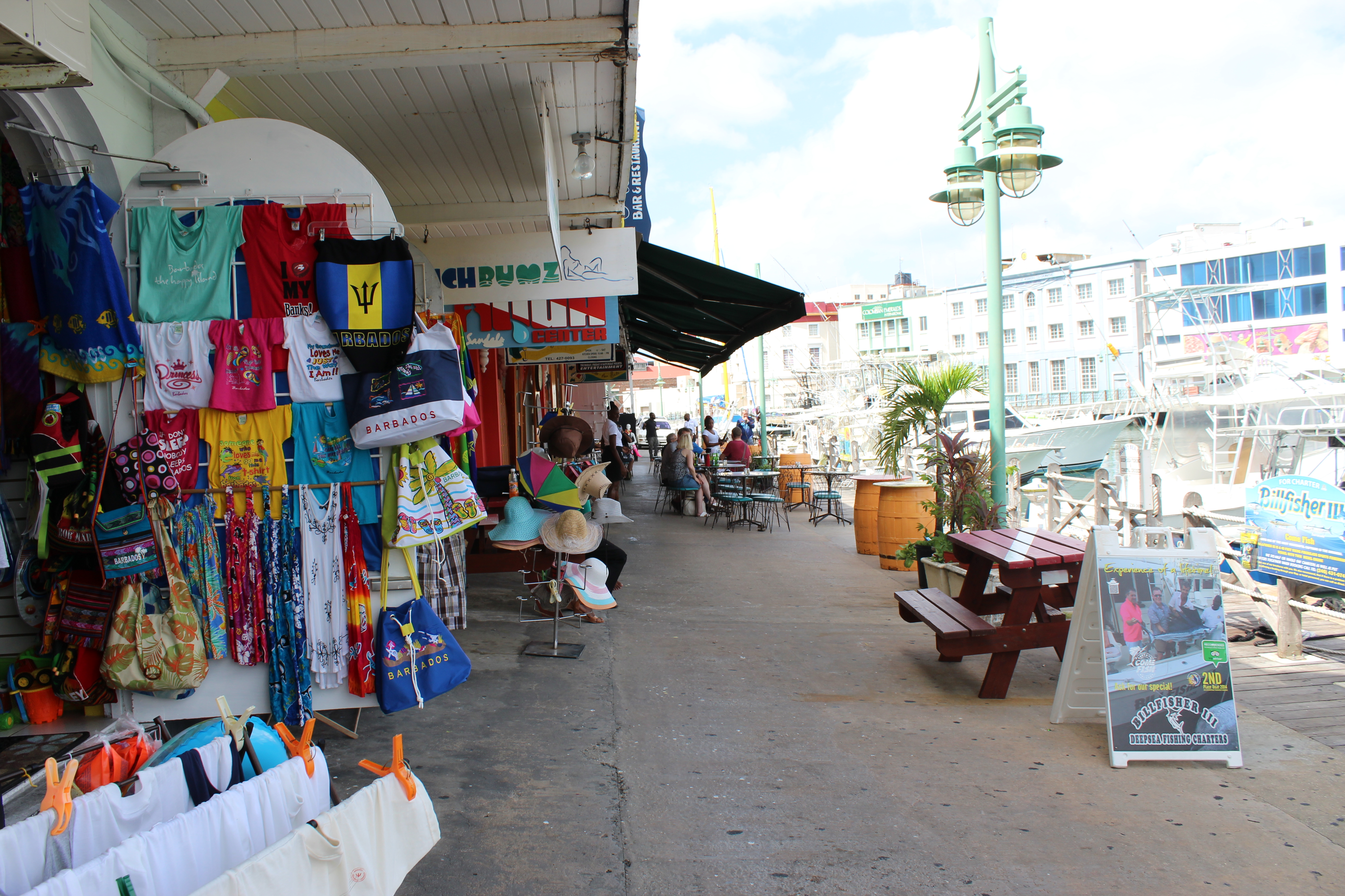 Colorful boutiques and cafes line the Careenage in Bridgetown