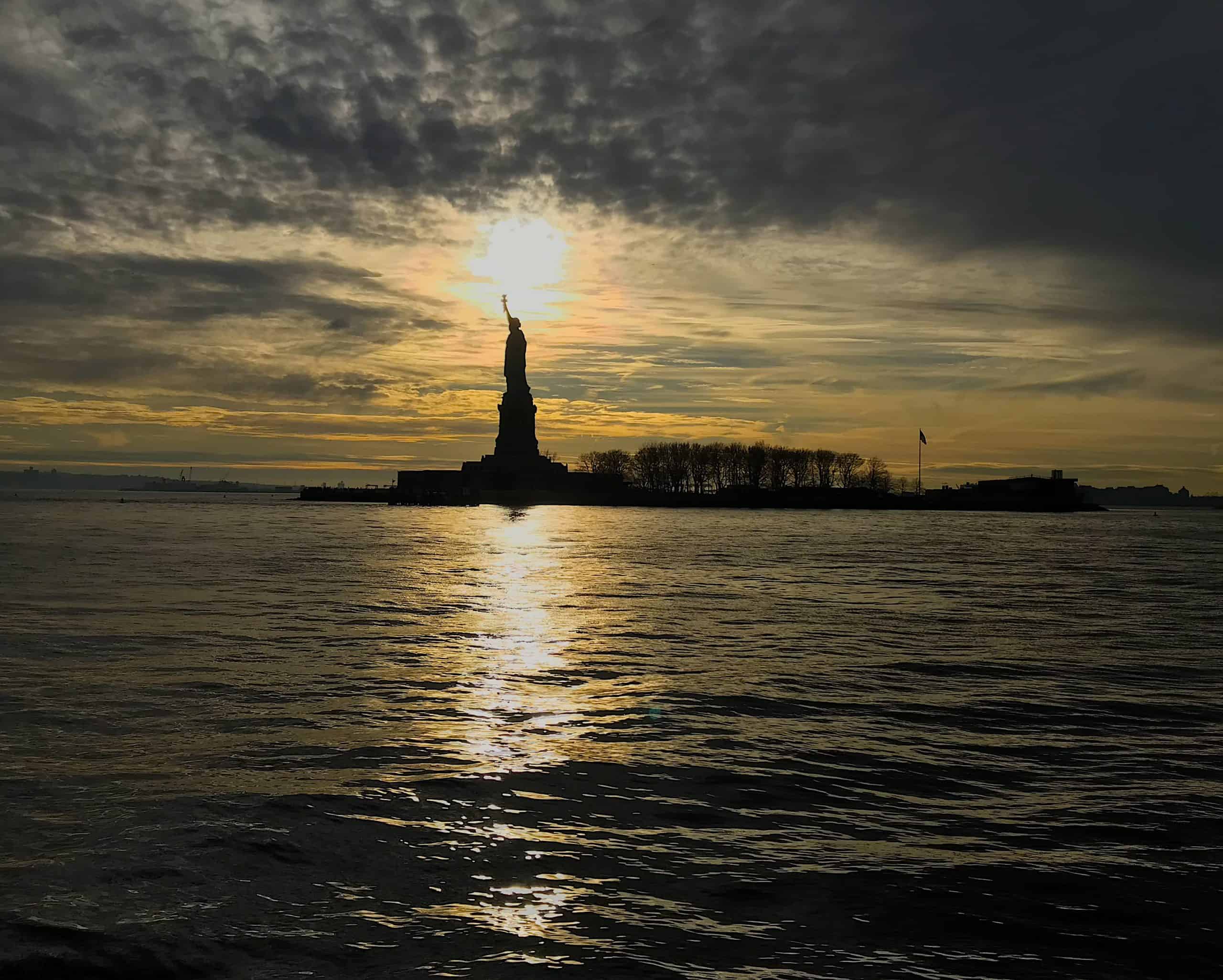 Statue of Liberty at Sundown Midtown Manhattan