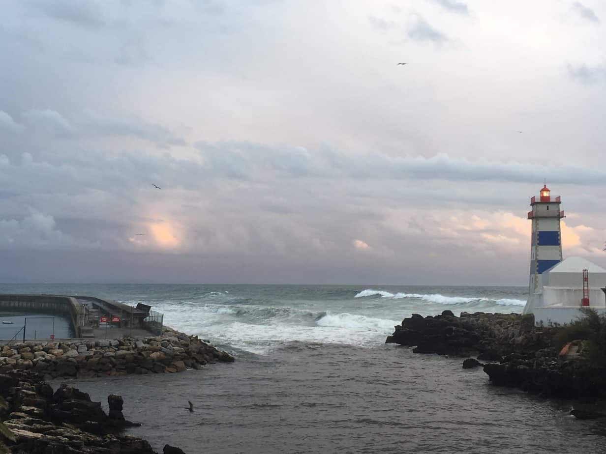 A lighthouse on a rocky shore
